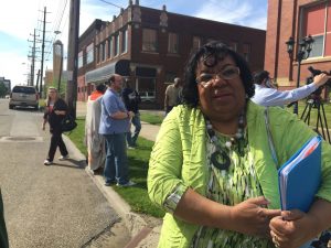 District Rep Kathleen with Youngstown education association President Larry Ellis in the blue shirt behind her attending the May 9th press conference against House Bill 70.